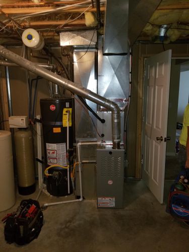 Furnace in basement and toolbag