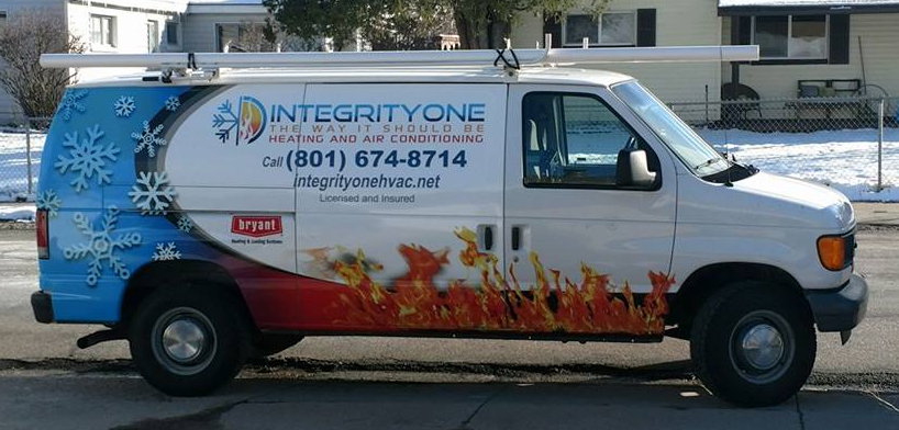 IntegrityOne van parked on a residential street